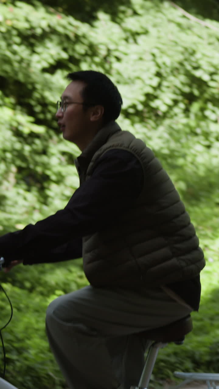 Person Riding a Bicycle on a Road