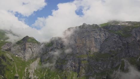 fly over majestic alpine mountains in switzerland