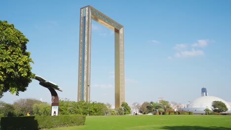 people at zabeel park with famous dubai frame in zabeel, dubai, united arab emirates