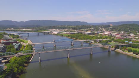 Aerial Drone reverse of Blue Bridge crossing Tennessee River in Chattanooga on a summer day