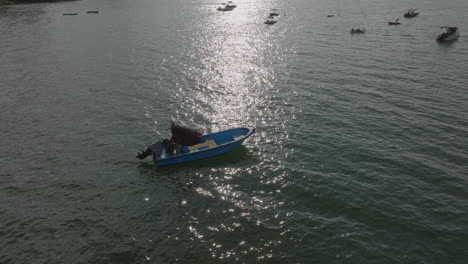 boats float on the water in the city in hong kong, china