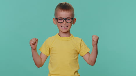 happy toddler children boy celebrating success, game winning, birthday, lottery goal achievemen