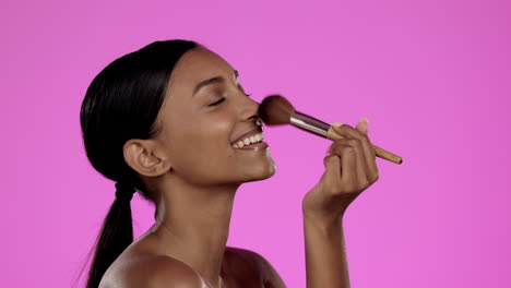 Beauty,-makeup-and-Indian-woman-with-brush-on-nose