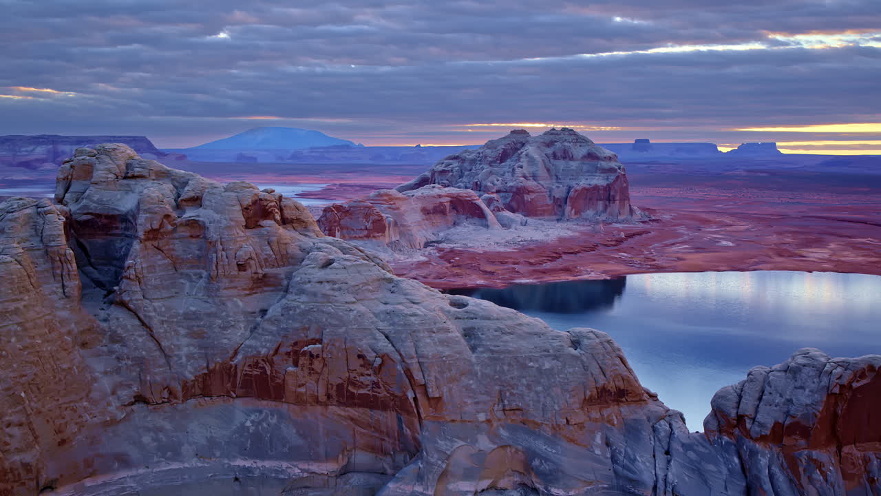 The drone smoothly maneuvers through Glen Canyon’s rugged terrain, emphasizing its breathtaking geological formations.