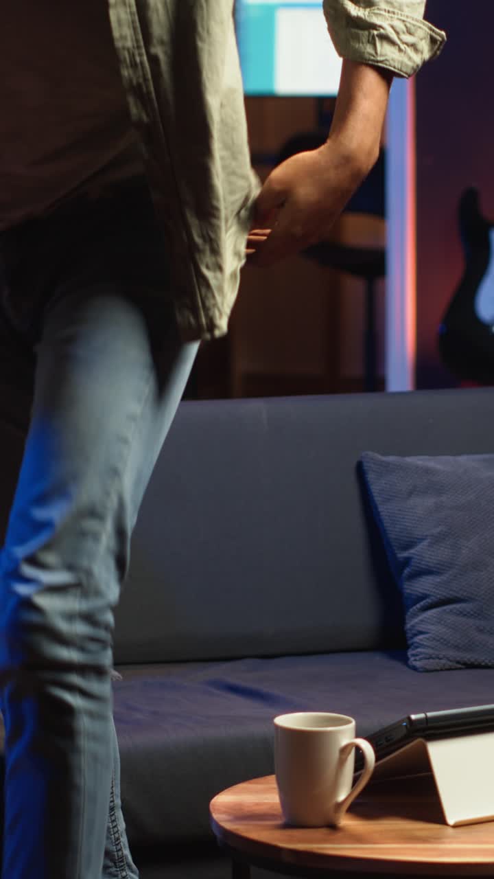 Vertical Video African american freelancer participates at a web class course on laptop