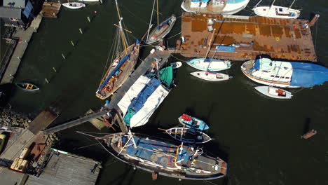 aerial view of a busy harbor with various boats