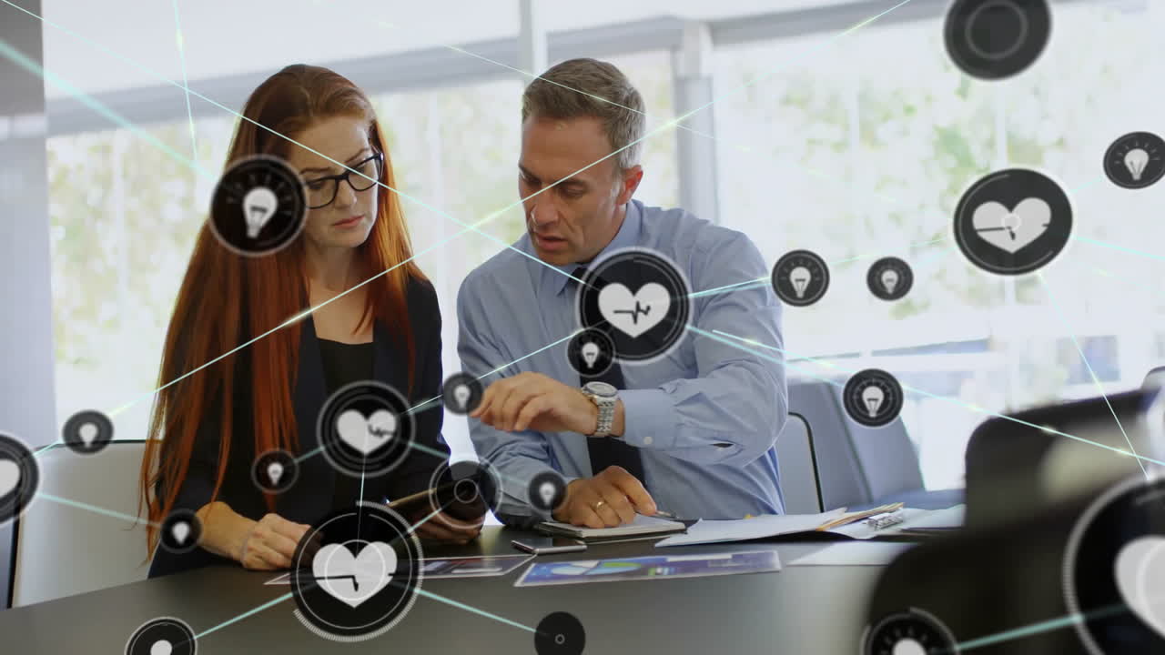 Discussing data with digital health animation, business professionals in meeting room