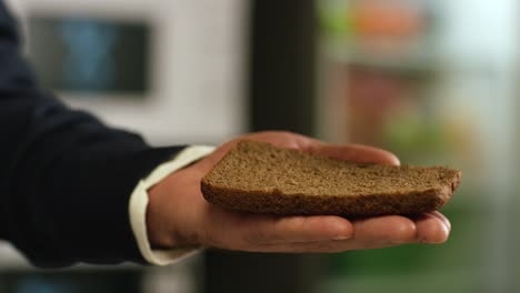 person holding a sandwich