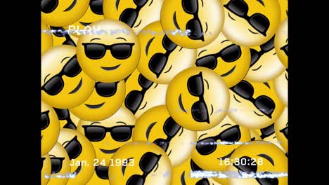 Vhs-glitch-effect-over-multiple-face-wearing-sunglasses-emojis-on-black-background
