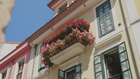 handheld shot of the exterior of a beautiful house in gijon, asturias - slow motion