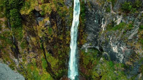 New-Zealand-Drone-Aerial-of-Devil’s-Punchbowl-Waterfall,-Camera-Panning-Left