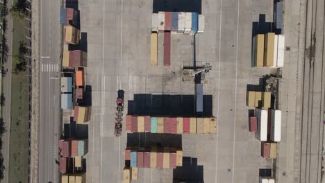 Bird's-eye-view-flyover-of-tidy-container-port-in-Durres,-Albania