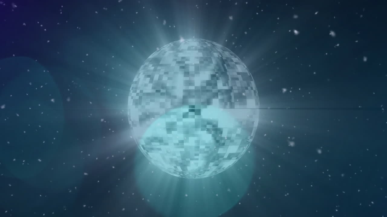 Animation of disco ball over snow falling