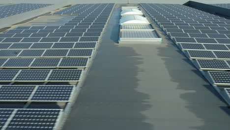 Solar-Panels-on-Roof-Producing-Clean,-Green-Energy-AERIAL