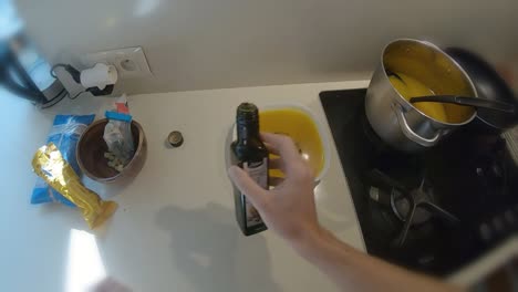 POV-first-person-seasoning-orange-pumpkin-soup