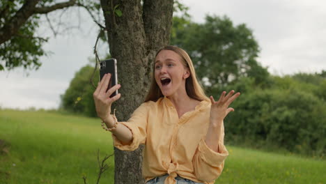 young woman, mobile phone, video call, happy