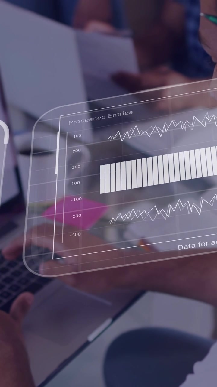 Vertical video: Adult man typing on laptop starting AR commerce UI showing graph order map tracking