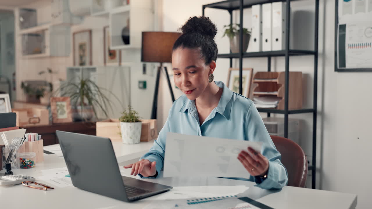 Woman working with laptop in office