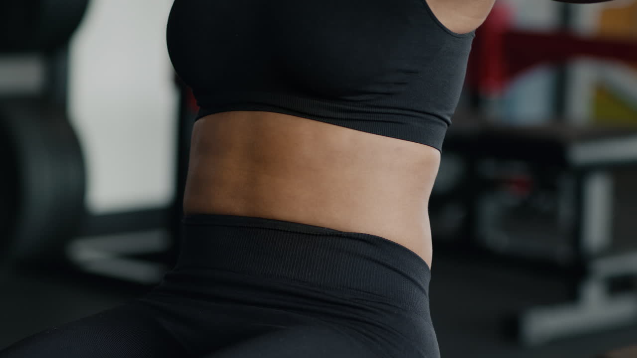 Woman Working Out in Gym