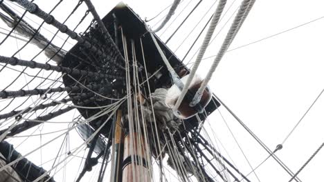 1700 wooden ship mast during rain looking up