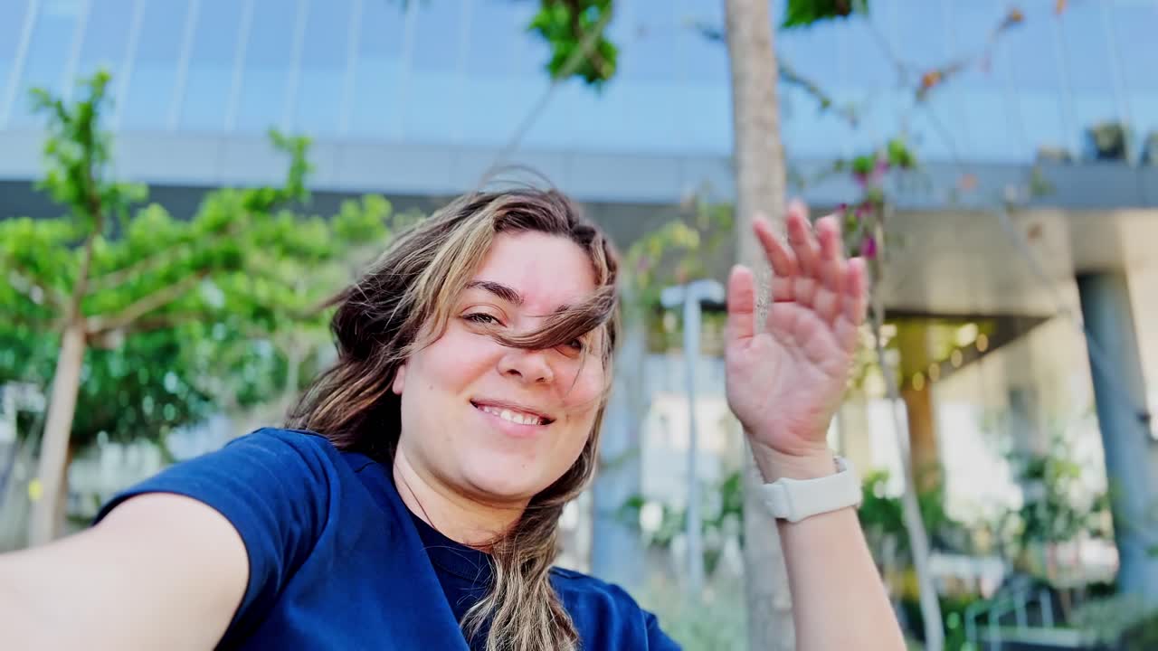 Happy Young Woman's Sunny Outdoor Selfie