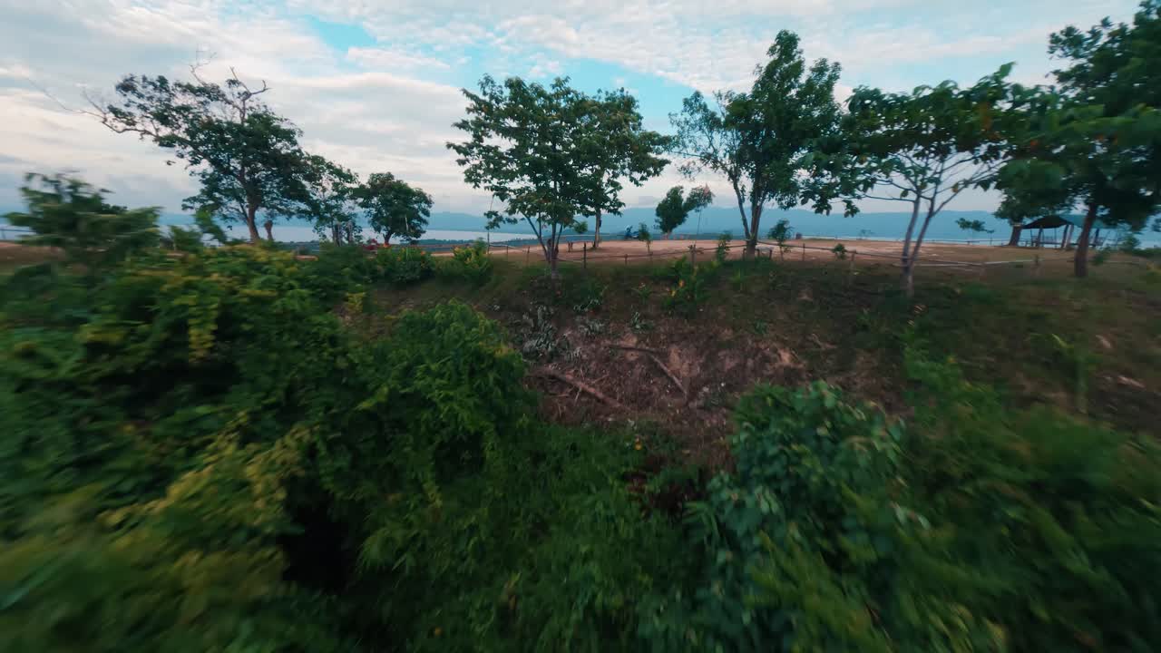 FPV Drone Flyby of Rocky Cliffs and Vibrant Blue Water at Hundred Steps Beach in San Vicente, Palawan, Philippines – Cinematic Horizontal Coastal View