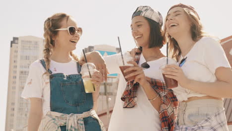 happy friends enjoying drinks