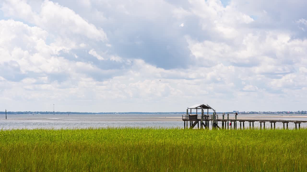 Marsh view time lapse of Charleston harbor as seen from Alhambra Hall, Mt. Pleasant, South Carolina