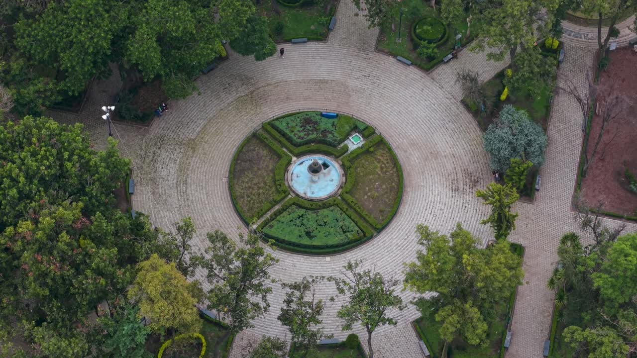Aerial video of an out-of-order fountain situated in a Mexico City park