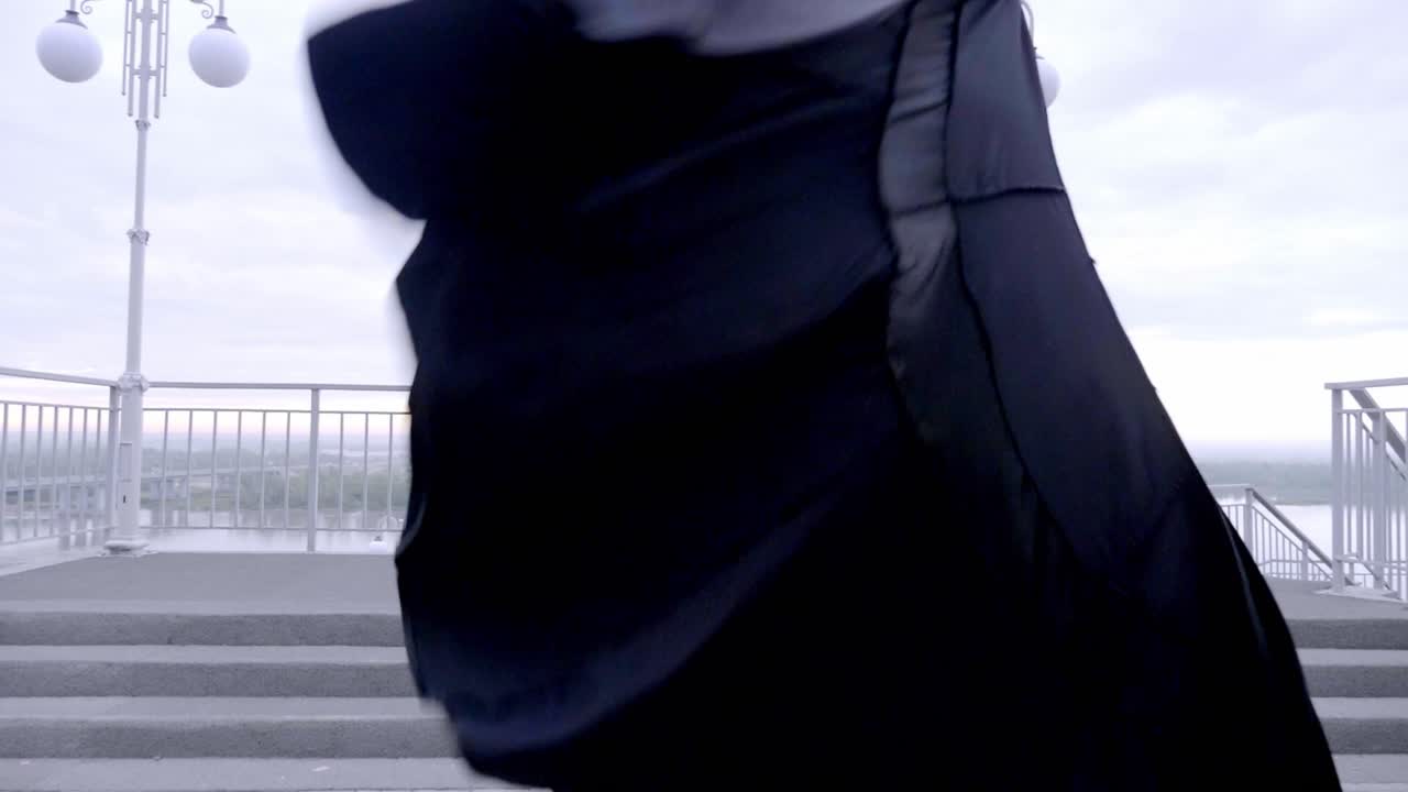 Ballroom dancer in motion outdoors