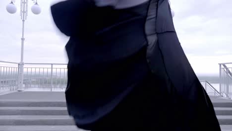 ballroom dancer in motion outdoors