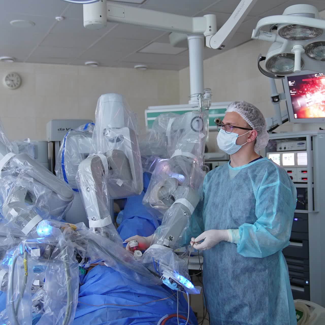 Robot surgeon working in modern hospital. Da vinci bot surgery operation