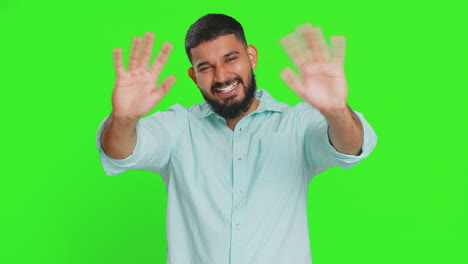 happy man smiling friendly waving hands gesturing hello greeting or goodbye meeting invitation
