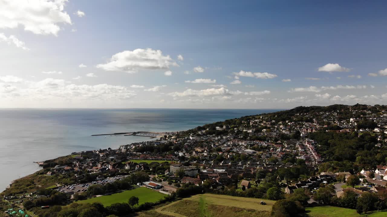 Aerial Of Lyme Regis With View Of English Channel. Dolly Left