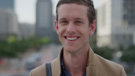 close-up-portrait-attractive-young-business-man-laughing-enjoying-professional-urban-lifestyle-in-city-successful-male-executive-slow-motion