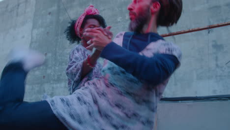 couple dancing argentine tango on rooftop in neon light