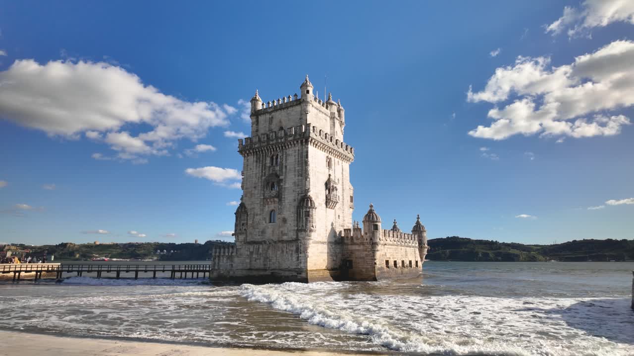 Belém Tower with waves in Lisbon, slow motion