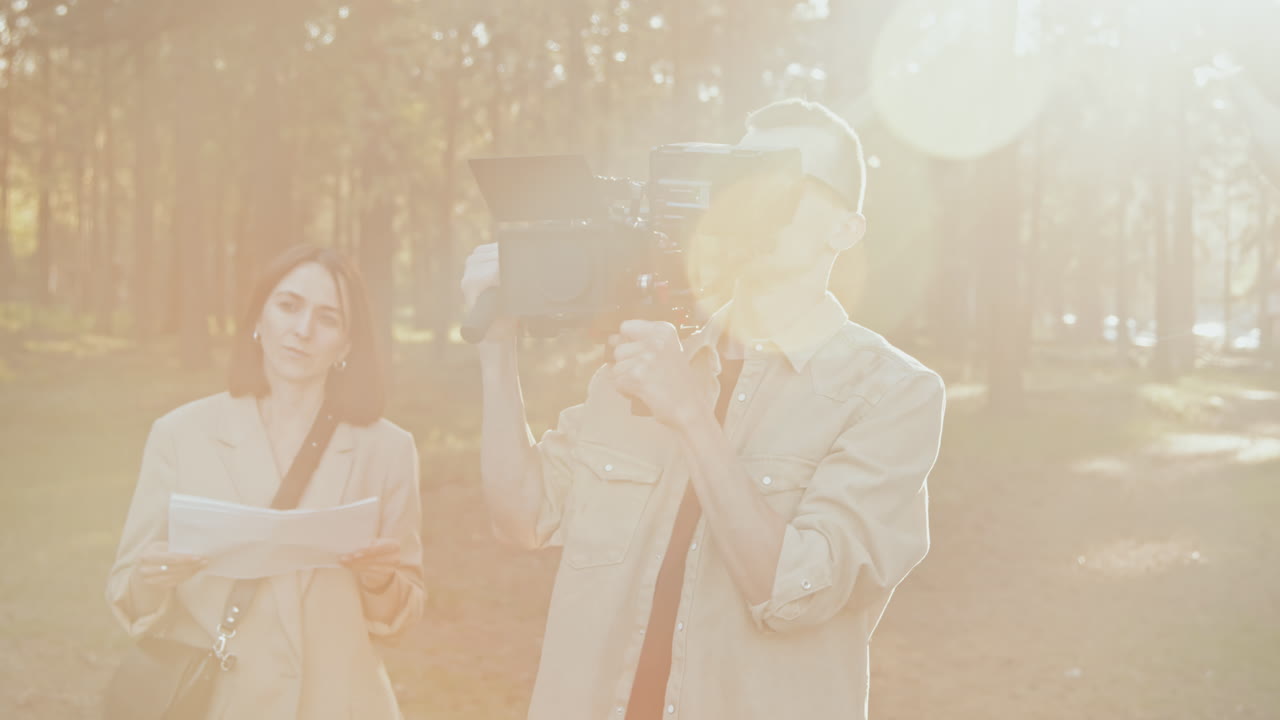 Male Operator Shooting Video Outdoors