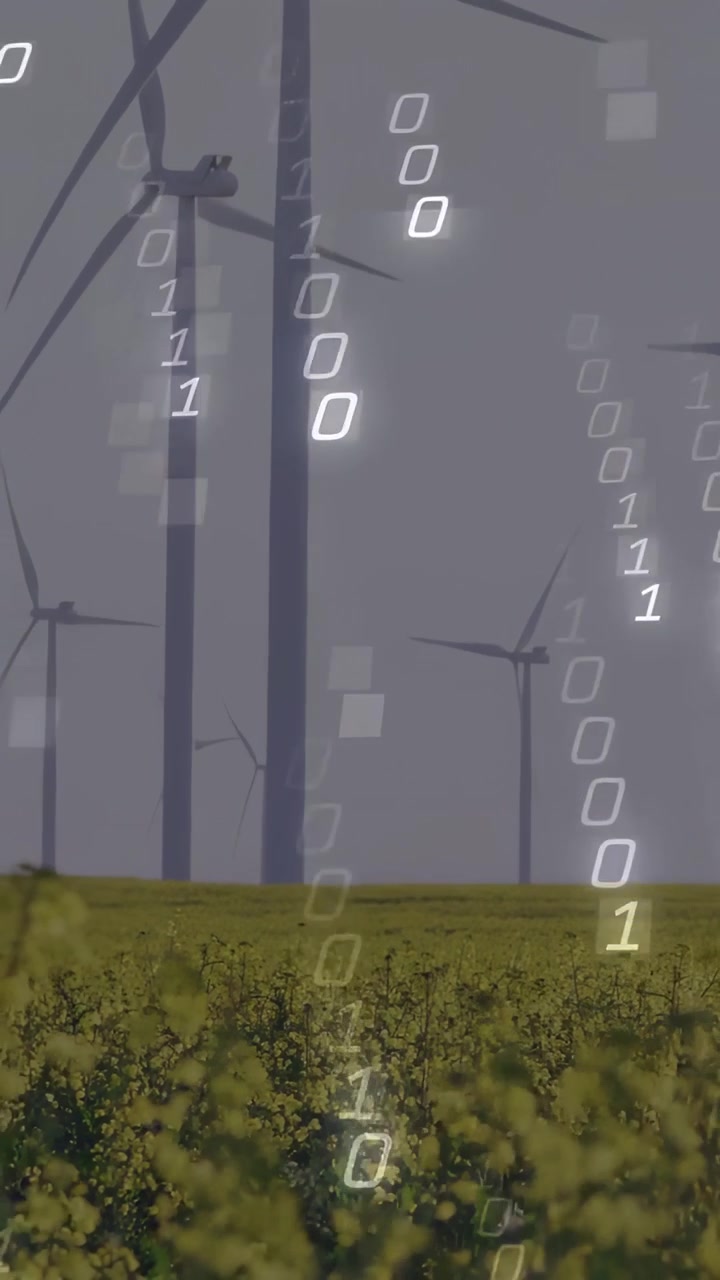 Video verticale: Sovrapposizione binaria che appare su turbine che ruotano su un campo giallo, mostrando dati sull'energia