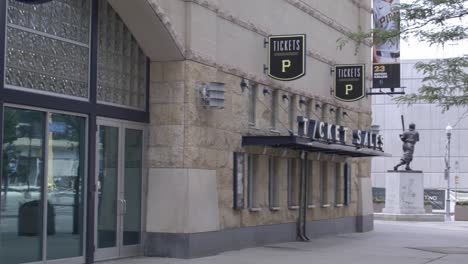 pnc park ticket office and baseball player statue in pittsburgh