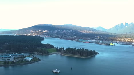 Cinematic-drone-shot-of-a-beautiful-city-and-mountain-range