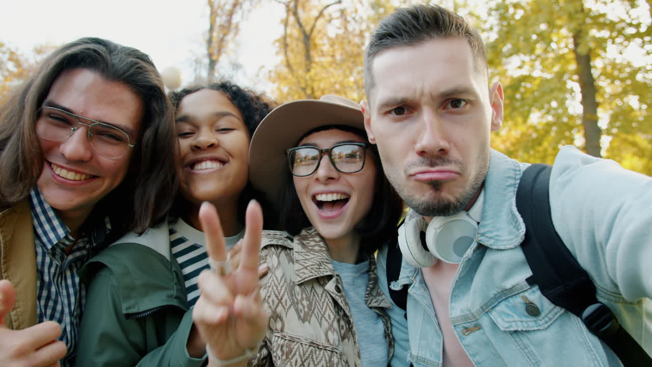 Friends Taking a Selfie in Autumn Park