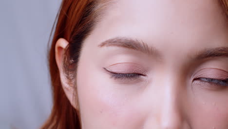 close up of positive human asian woman eye and open looking at camera with happiness emotion attractive natural