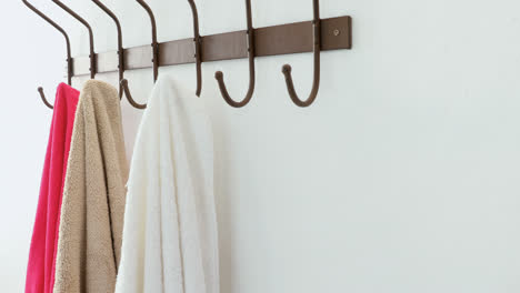 Towels-hanging-on-hook-4k