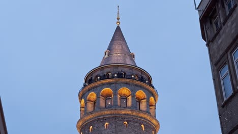 a view of the galata bridge in istanbul in the evening
