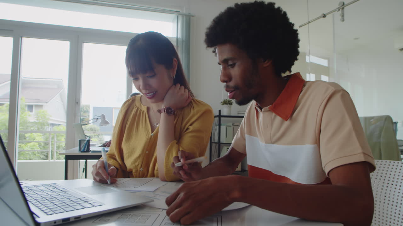 Diverse Colleagues Working on Project Together