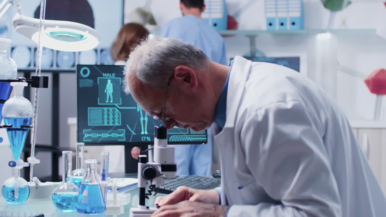 Scientists working in a lab conducting research and analysis