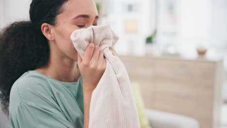 laundry, fresh and a woman smelling a scarf