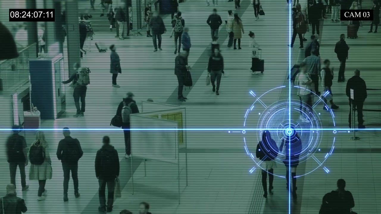 CCTV Surveillance Footage of Commuters Walking Through a Busy Train Station