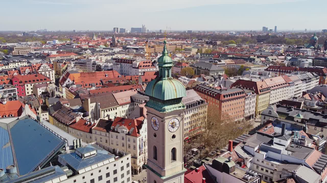 Aerial view over Munich's rooftops around Marienplatz, showcasing cityscape